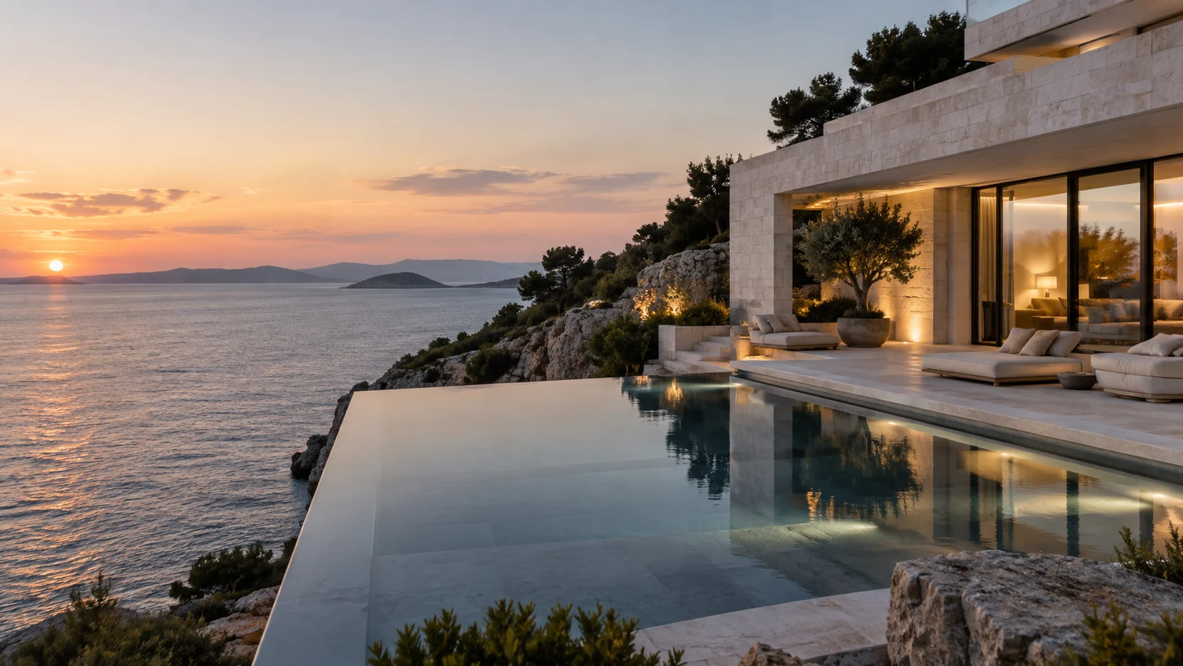A contemporary Mediterranean villa with an infinity pool overlooking the sea.